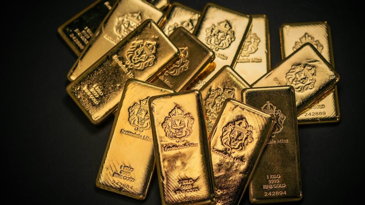 Stacked fine gold bars